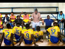 File
Harbour View FC head coach Fabian Taylor (standing) speaks with his team at half-time during their Red Stripe Premier League game with UWI Football Club at the UWI Mona Bowl in St Andrew on Wednesday, January 9, 2019. Harbour View won 1-0.