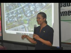 Marlene Malahoo Forte speaks during a community-consultation meeting on the Montego Bay Perimeter Road project at the Howard Cooke Primary School in Catherine Hall, St James, last Wednesday. 