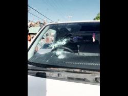 
The windscreen of the courier van was riddled with bullets as the driver and a security guard were cut down by robbers in Montego Bay on Sunday.
