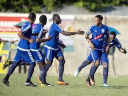 Suelae McCalla (second right) of Mount Pleasant FA celebrates a goal scored against Waterhouse FC, with teammates at the Drewsland Stadium on Thursday, January 10. 