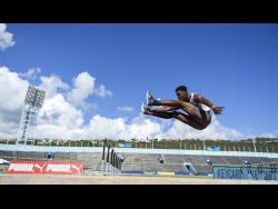 file
Ryan Brown of the GC Foster College of Physical Education and Sport places third in the Men’s Long Jump final with a distance of 6.89m in the NCB Intercollegiate Track and Field Championships at the National Stadium on Saturday, April 7, 2018.