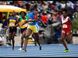 Ashanti Moore (second right) of Hydel High wins the Class One Girls 200m final at the ISSA/GraceKennedy Boys and Girls’ Athletics Championships on Saturday, March 30, 2019. 
