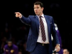 FILE - In this Oct. 20, 2018, file photo, Los Angeles Lakers head coach Luke Walton directs his team during the second half of an NBA basketball game against the Houston Rockets in Los Angeles.
