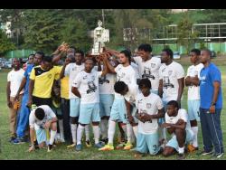 Faulkland FC celebrate after winning the JFF Western Confederation midseason final last year.