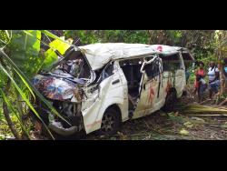 The ill-fated bus that crashed along the Black Hill main road in Portland yesterday, killing one student and injuring 26 persons.
