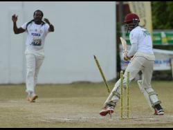 Davion Wilson from Yallahs looks back as his stumps go flying after he was bowled by Keith Edwards during the Social Development Commission (SDC) T20 Cricket Competition at the Goodyear Oval in St Thomas on Sunday, May 26, 2019.