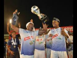 Portmore United’s Damian Williams (left) celebrates with teamate Romaine Brackenridge (right) after their team’s 1-0 win over Waterhouse in the Red Stripe Premier League final at the National Stadium earlier this year.
