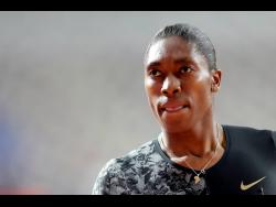 FILE - In this Friday, May 3, 2019 file photo, South Africa’s Caster Semenya competes in the women’s 800-meter final during the Diamond League in Doha, Qatar. The governing body of track argued in court that Caster Semenya is “biologically male” and that is the reason she should reduce her natural testosterone to be allowed to compete in female competitions. 