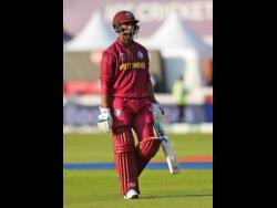 West Indies’ Shimron Hetmyer leaves the field after being dismissed during the Cricket World Cup match between New Zealand and West Indies at Old Trafford in Manchester, England, last Saturday.
