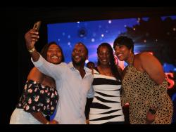 Cast members of Ring Games Season 2, Stephanie Hazle, Christopher 'Johnny' Daley, Karen Harriott and Dahlia Harris have a little fun at the private screening held last Friday, July 12 at the TVJ studios.