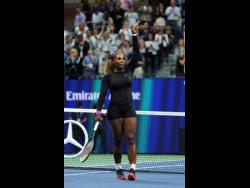 Serena Williams, of the United States, reacts after defeating Elina Svitolina, of Ukraine, during the semi-finals of the US Open tennis championships yesterday. 