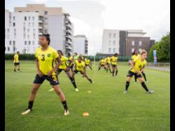 Reggae Girlz  executing drills at a training session at Stade Eugene Thenard in Grenoble, France, ahead of a match in the FIFA Women’s World Cup on Monday June 17, 2019. 