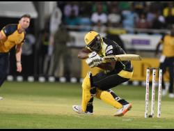 Jamaica Tallawahs batsman Andre Russell is floored by a short ball from St Lucia Zouks’ Hardus Viljoen.