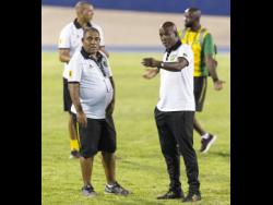 Head coach of Jamaica’s senior women’s football team, Hue Menzies (left), and his assistant coach Lorne Donaldson.