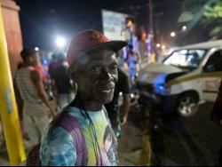 Michael Wilson was seated in the front seat of the Toyota  Probox taxi as it collided with a Nissan Bluebird motor car at the intersection of North and East streets in Kingston, last night.