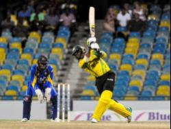 Andre McCarthy hits a four during a Windies Super50 Cup match between Jamaica Scorpions and Barbados Pride on October 20, 2018.