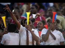 Students from St Andrew Technical High School cheer on their schoolmates as the Spanish Town-based school beat Jamaica College 2-1 in their final quarter-final group game on November 12, 2019.