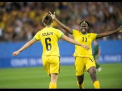 Havana Solaun celebrates with Khadija Shaw (right) moments after scoring Jamaica’s first in the women’s World Cup football against Australia at the 2019 FIFA Women’s World Cup at Stade des Alpes in Grenoble, France on  June 18. 