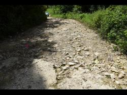 A section of the roadway near the St Elizabeth/Westmoreland border of Kilmarnock. The residents say it has been in a deplorable condition close to 30 years.