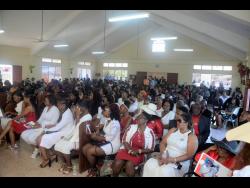 Mourners packed the South Side Church of Christ in York Town, Clarendon, to pay their last respects to Franklyn Paisley.