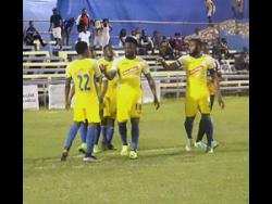 McKauly Tulloch celebrates with his teammates during the 2017 Red Stripe Premier League season.McKauly Tulloch celebrates with his teammates during the 2017 Red Stripe Premier League season.