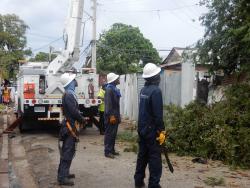 JPS workers were seen carrying out routine activities in Jones Town, Kingston, on Monday.