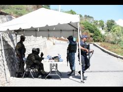 Credit: Ian Allen Security forces monitoring Seven Miles and Eight Miles in Bull Bay, St Andrew, now under quarantine.
