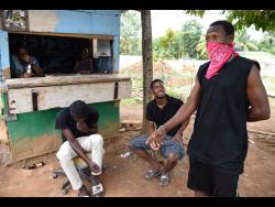Young men in Time and Patience, a community near Linstead in St Catherine, say they are prepared to endure the lockdown in order to see the back of COVID-19.