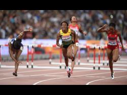 Jamaica’s Danielle Williams takes gold in the women’s 100m hurdles at the 2015 World Championships in Beijing, China.