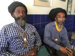 Christopher Graham (left) and Junior Anderson are advocating for one of their Rastafarian role models to be buried in the National Heroes Park.