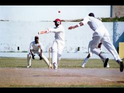 Franklyn Rose bowls to Jimmy Adams during a Jamaica first-class team’s practice match at Sabina Park in 1994.