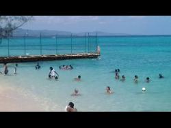 Beach goers make use of this Montego Bay beach.