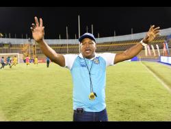 FILE
Lenworth Hyde, coach of Clarendon College, celebrates after they defeated Jamaica College on penalties to win the Olivier Shield football title last year.