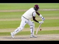 West Indies captain Jason Holder bats during the last day of the second Test match against England at Old Trafford in Manchester, England, on Monday, July 20.
