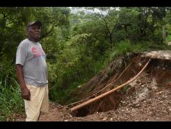 Zephianiah Slater looks at some of the damage that was caused by heavy rains from Tropical Storm Laura.