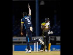 CPL T20/ via Getty Images
Jason Holder (left) of Barbados Tridents celebrates the dismissal of Rovman Powell (right) of Jamaica Tallawahs during last night's Hero Caribbean Premier League match at Queen's Park Oval in Port of Spain, Trinidad and Tobago.
