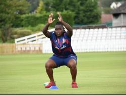 West Indies Women all-rounder Deandra Dottin stretches during a training session. 