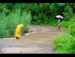 Residents have to contend with this rushing water whenever there is steady rainfall.