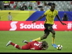Canada’s Michael Petrasso is taken down by Jamaica’s Cory Burke during a Concacaf Gold Cup quarter-final match on Thursday, July 20, 2017.