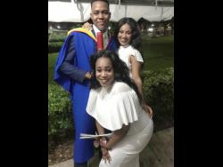 Simone Whyte (centre) with two of her children, Tojorn (left) and Synovia.