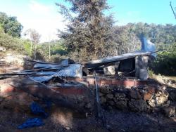 This house was burnt by residents following the shooting death of Glester White in St D’Acre, St Ann, yesterday.