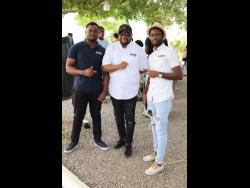 CEO of Frenz For Real Omar ‘Benji’ Benjamin (centre) is flanked by Keron Young (left), the studio’s producer and marketing manager, and Fabian Francis, artiste manager. 
