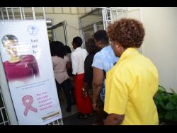 Women line up for cervical cancer screening at the Jamaica Cancer Society. 