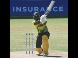 Jamaica Scorpions’ Brandon King accumulates runs on the offside during his innings of 97 against the T&T Red Force in a Regional Super 50 match yesterday.