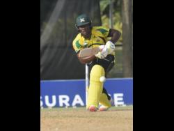 Jamaica Scorpions’ Odean Smith drives through the off side during his unbeaten innings of 68 as his team beat the Barbados Pride on February 21, 2021 to advance to the semi-final of Regional Super50 cricket competition.