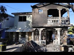 The two houses that were damaged in Friday’s fire.