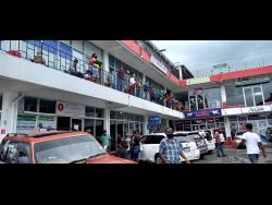 Persons in a plaza in Port Antonio.