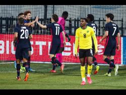US players celebrate after scoring their second goal during the international friendly soccer match between USA and Jamaica at SC Wiener Neustadt stadium in Wiener Neustadt, Austria, Thursday, March 25, 2021. 