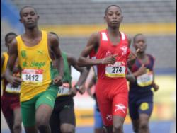 Credit: File
Alex Taylor of St Jago High School (left) fights off the challenge of Shacquille Gordon of Charlemont High School to win his heat of the boys class three 800 metres during day one of the ISSA/GraceKennedy Boys and Girls’ Athletics Championships at the the National Stadium in Kingston on Tuesday March 26, 2019