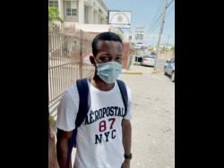 Farm worker Richard Roye outside the East Street offices of the Ministry of Labour and Social Secuity in Kingston, shortly after taking his COVID-19 test yesterday.